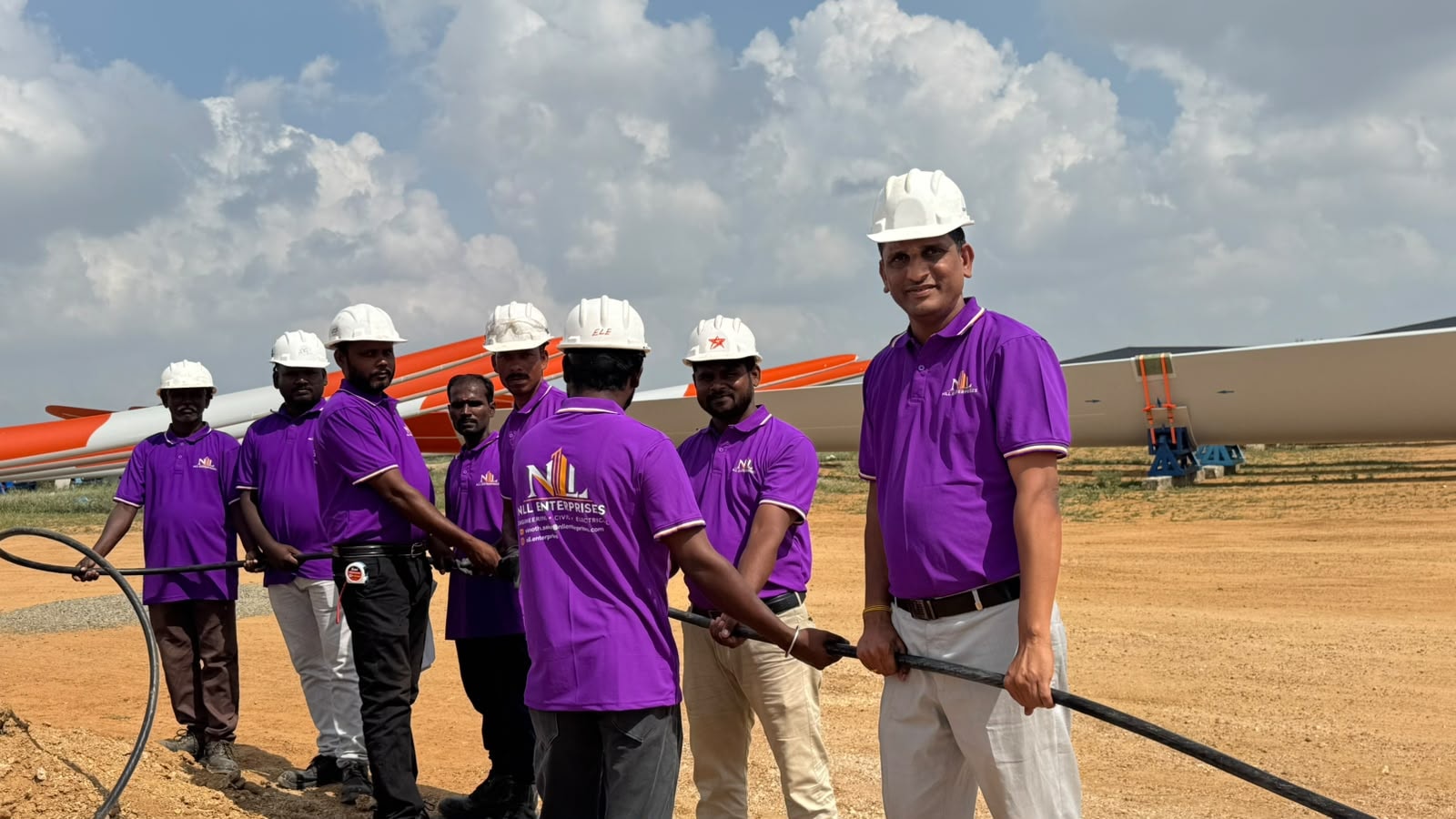 NLL Enterprises site team at wind turbine blade storage yard